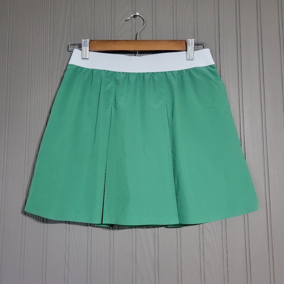 Puma Dresses & Skirts - PUMA Pleated Golf Skirt Athletic Shorts Lined Pockets Stretch Green Women's S